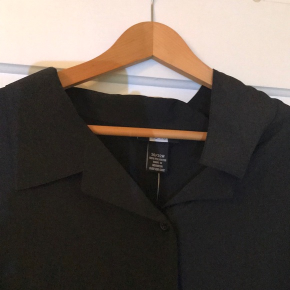 A black button down blouse. - Picture 2 of 6